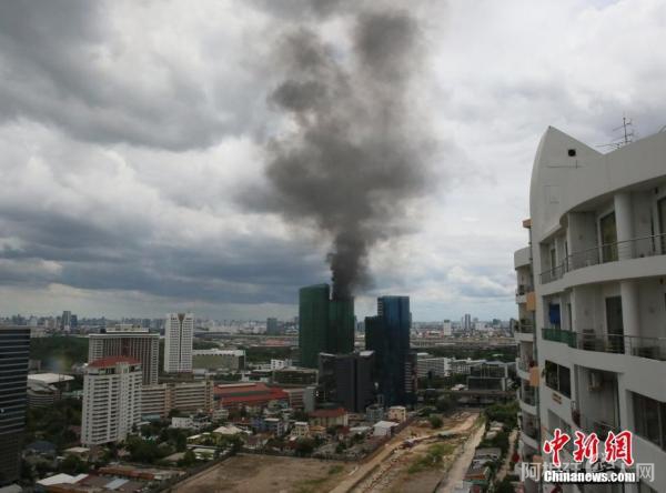 资料图：泰国一大楼发生火灾。 中新社记者 王国安 摄
